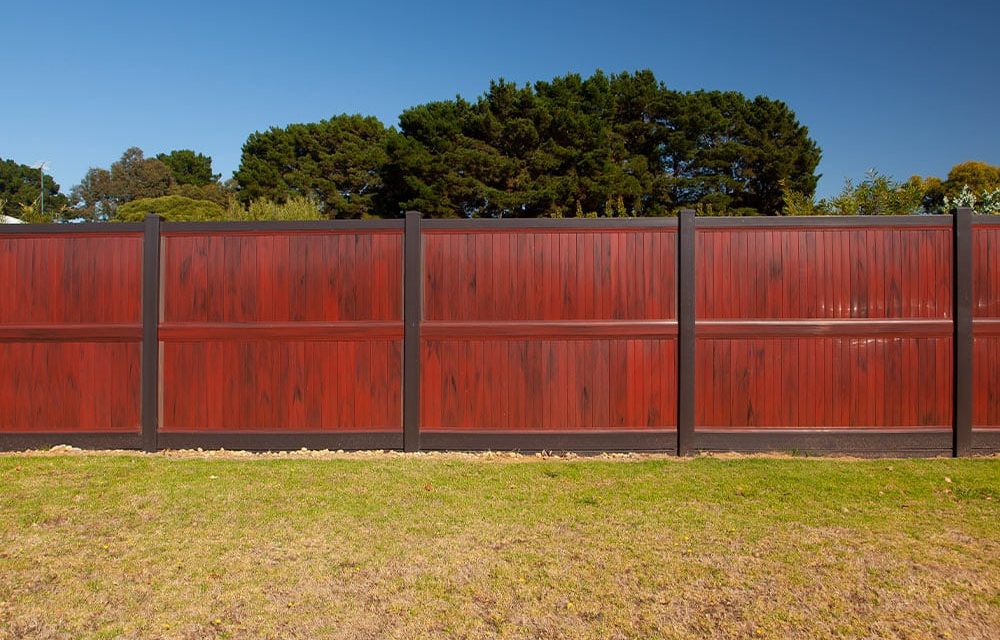 Think-Fencing-Custom-PVC-Panel-Fence-Ridge-and-Red-Gum-1
