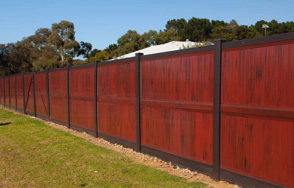 Think-Fencing-Custom-PVC-Panel-Fence-Ridge-and-Red-Gum-3